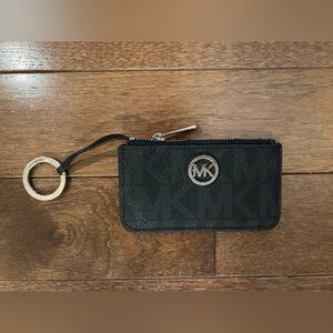 Black Michael Kors change purse with silver ring
